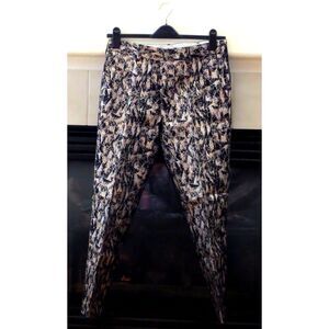Tia Cibani Designer Women's Menswear styled trousers Black and Metallic